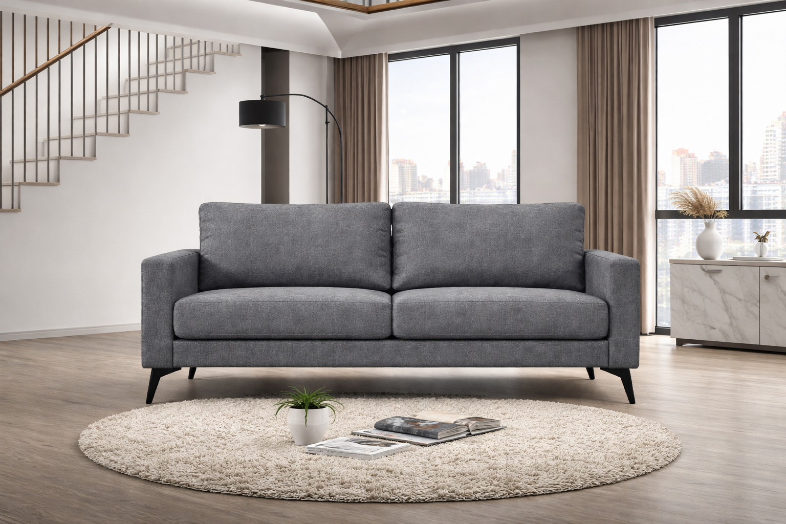 Modern grey sofa in Halifax living room showroom with contemporary decor