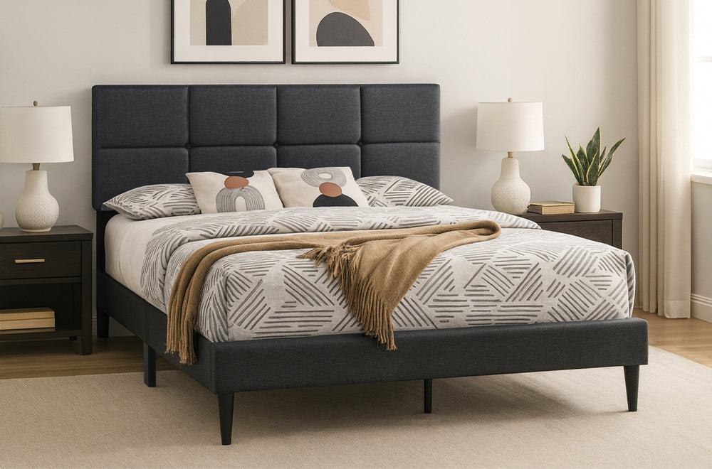 Schooner platform bed in charcoal linen angled from the side in a bedroom with neutral decor, bedside tables, and lamps