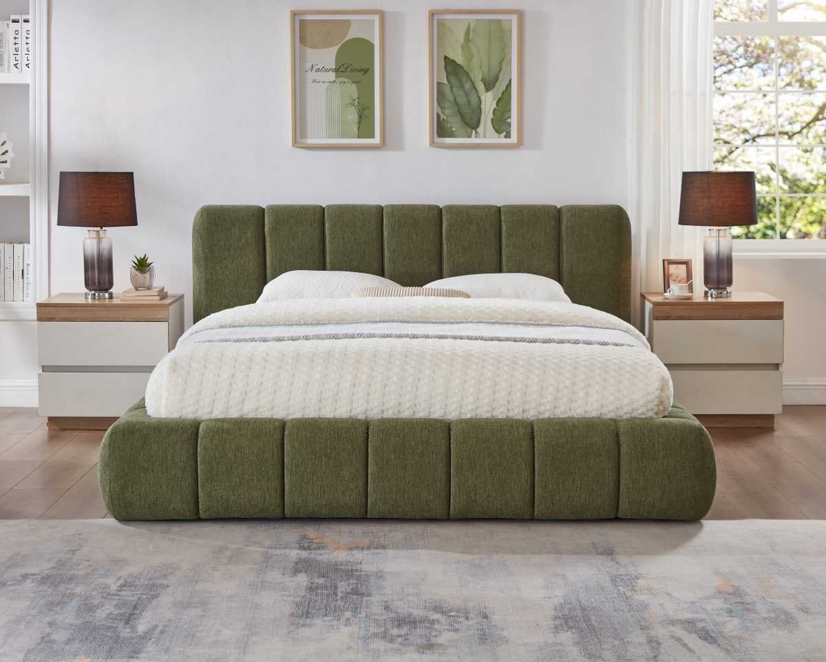 Green Fairview Platform Bed with vertical channel upholstery on headboard and footboard beside wooden nightstands with lamps