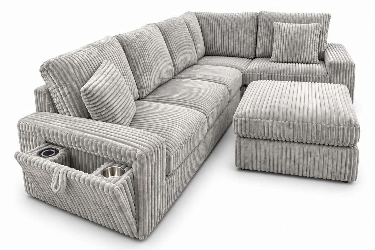 Angled side view of the Aspan grey sectional sofa showing ribbed upholstery, arm cup holders and matching ottoman