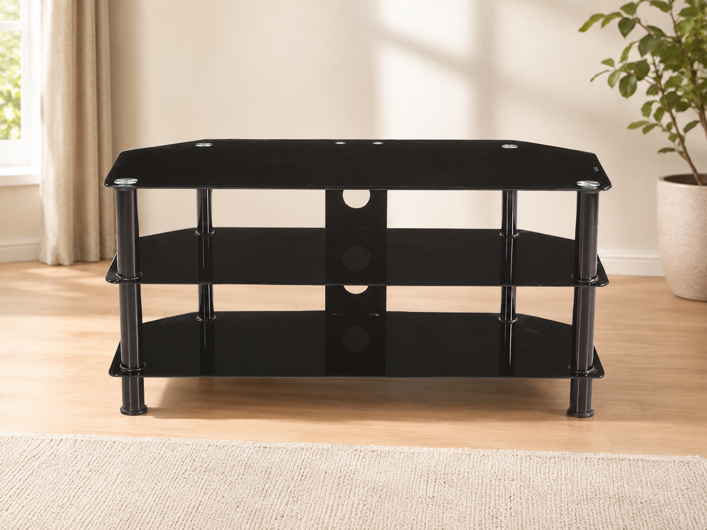 Black glass TV stand with open shelves, rounded corners, and cylindrical support legs.