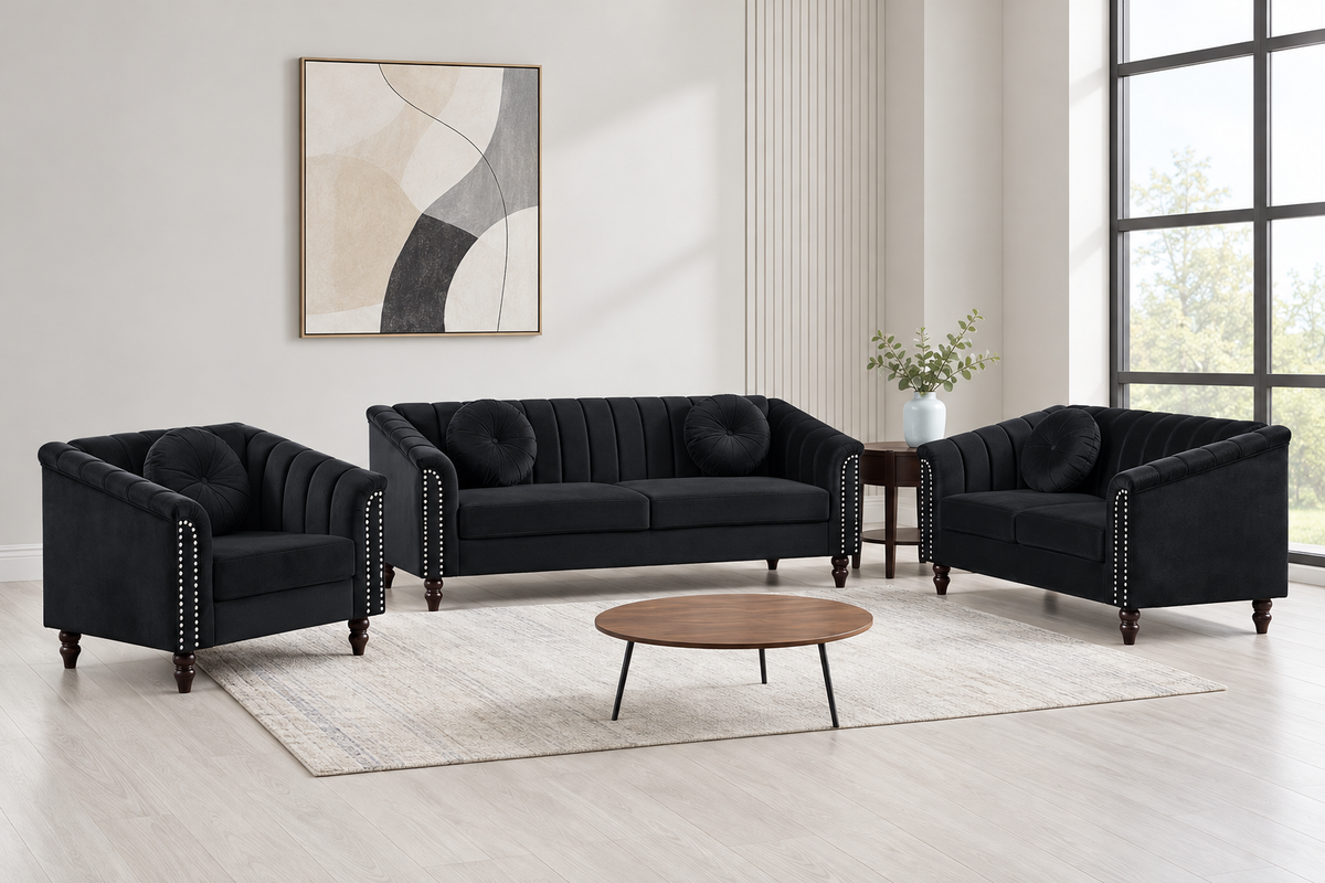 John black 3-piece sofa set arranged with a matching sofa, loveseat and armchair in a bright room.
