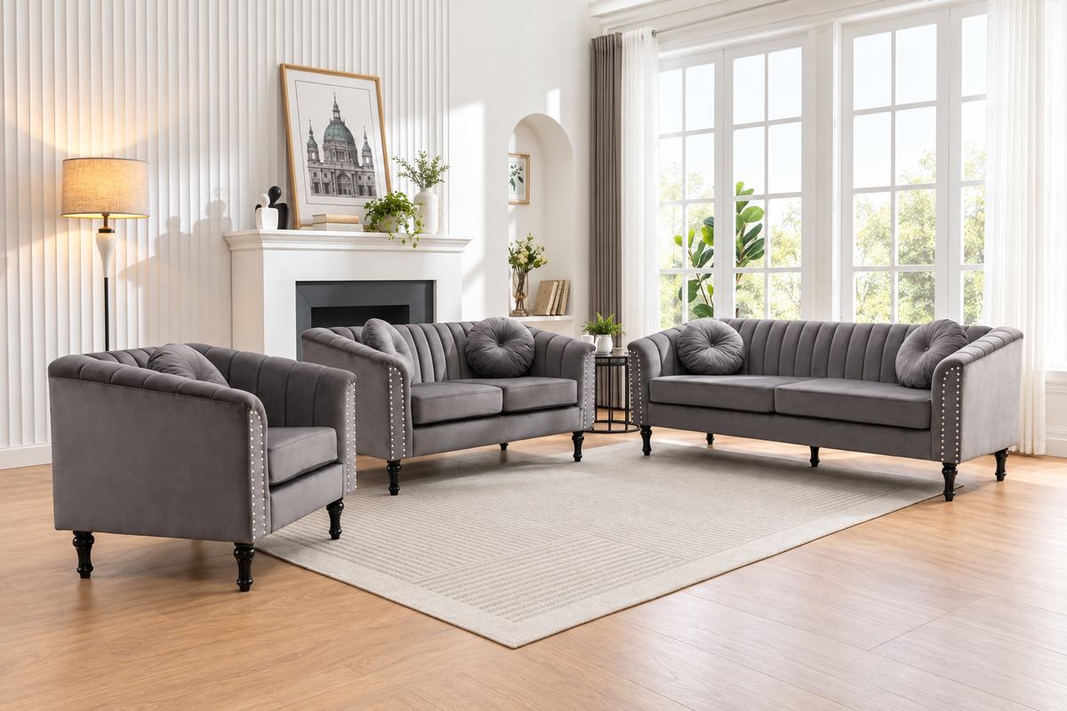 John grey 3-piece sofa set arranged around a coffee table in a furnished living room.