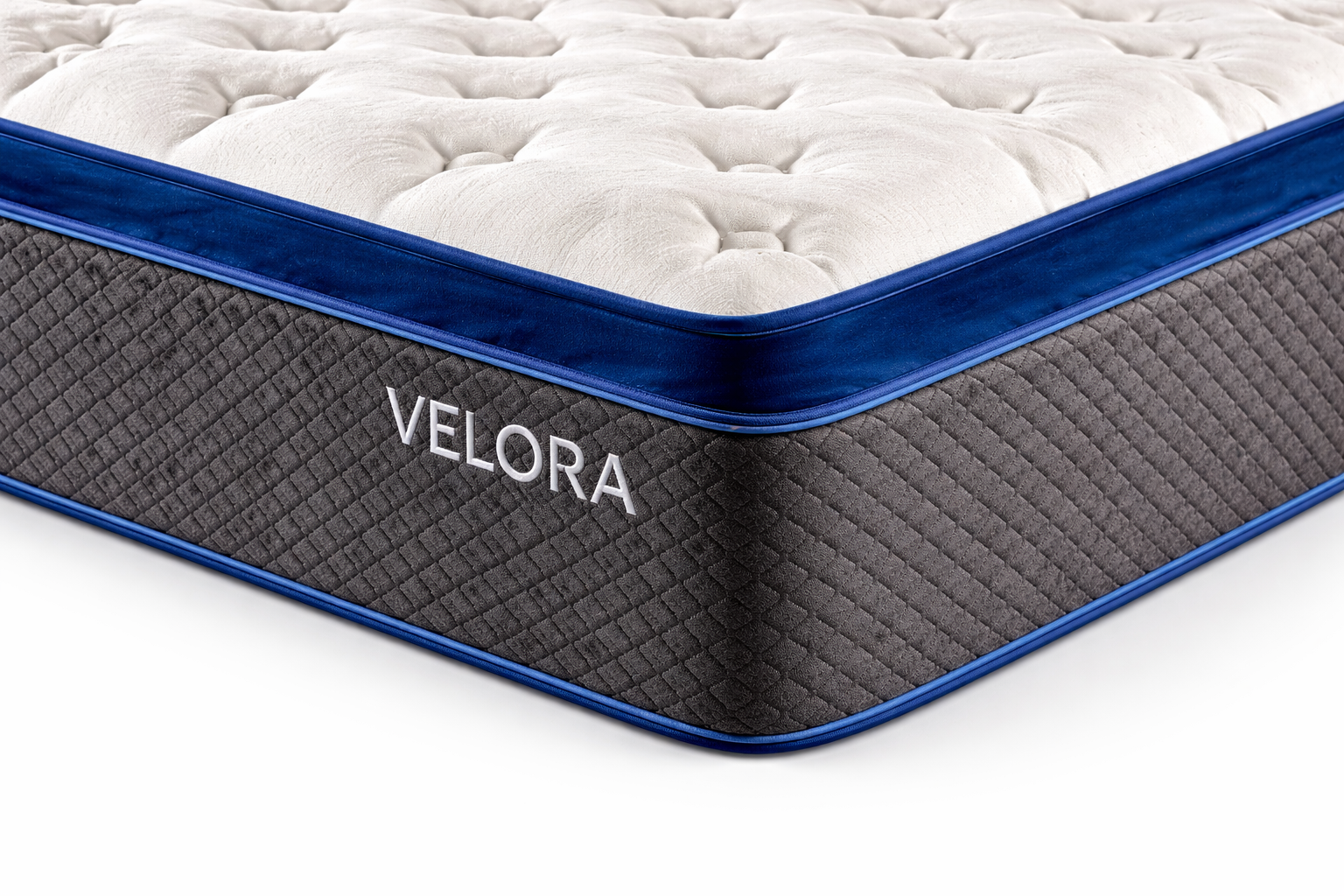 Close-up corner of Velora mattress showing stitching and side fabric