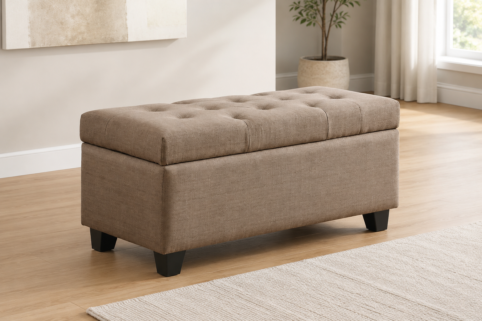 Brown fabric storage bench with a button-tufted lid and dark tapered legs in a modern neutral room.