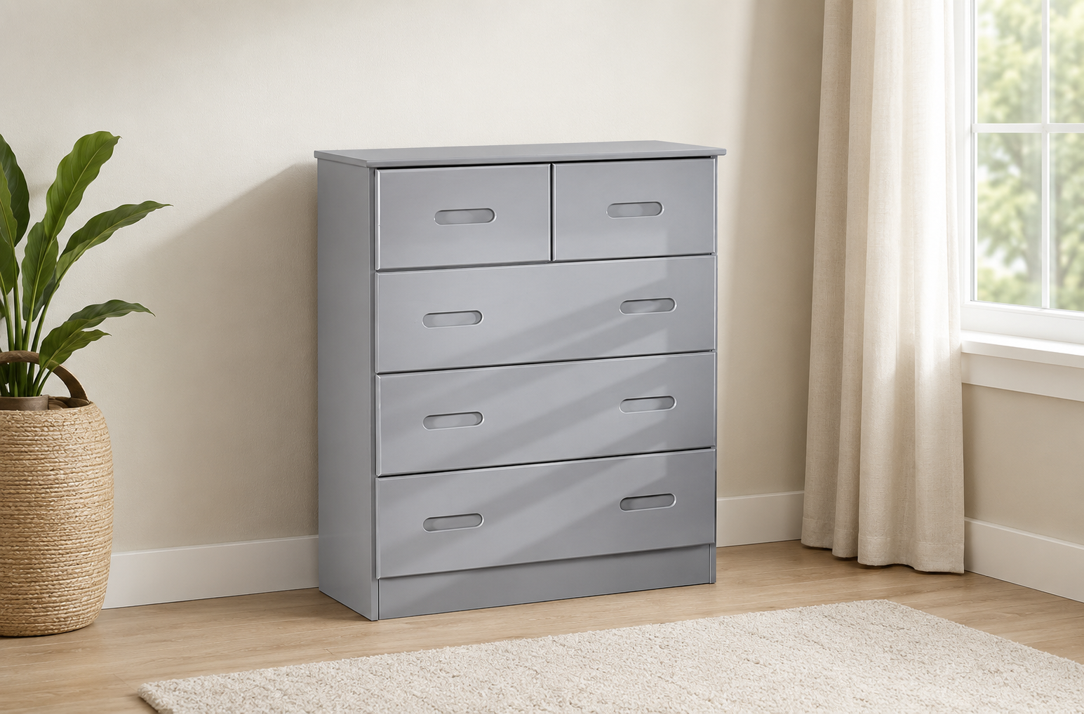 Gray bedroom dresser with five drawers, recessed handles, and a clean modern design in a neutral room.