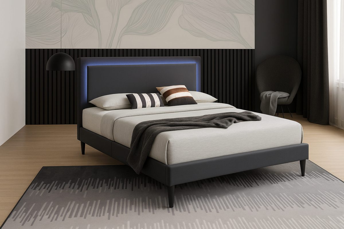 Portside platform bed in charcoal linen seen from a corner angle with beige bedding and decorative pillows