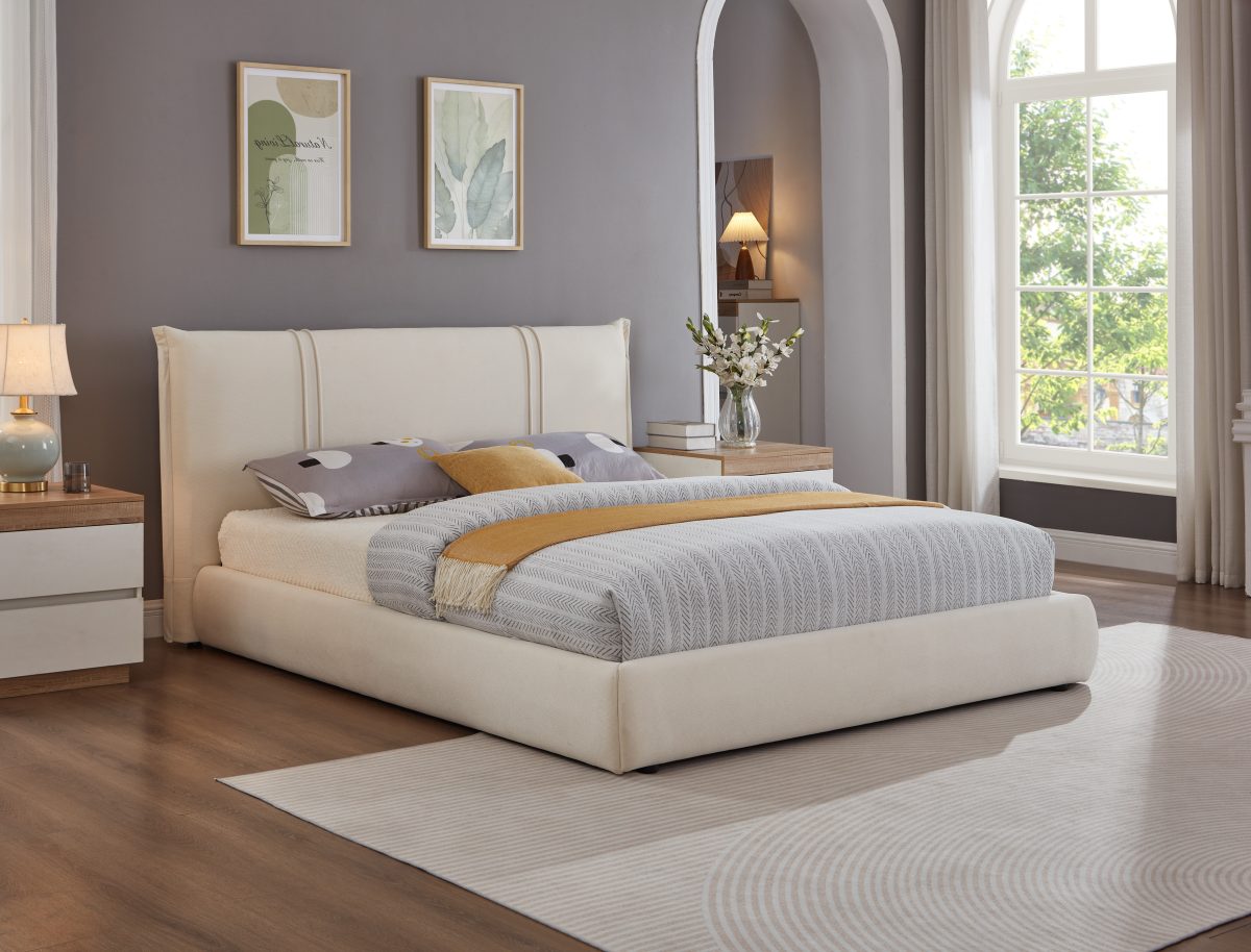 White Cornwallis platform bed with upholstered headboard and footboard in a bedroom with nightstands and wall art