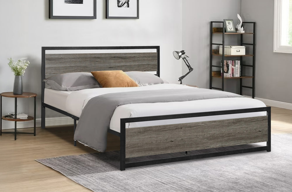 Bedroom with a wooden bed frame, white bedding, and side tables.