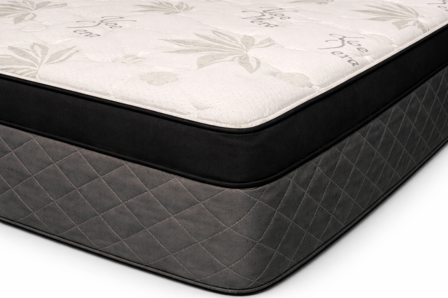 Close-up corner view of Comfort Best Hybrid Mattress showing beige aloe vera euro-top, black piping edge, and grey quilted side panel.