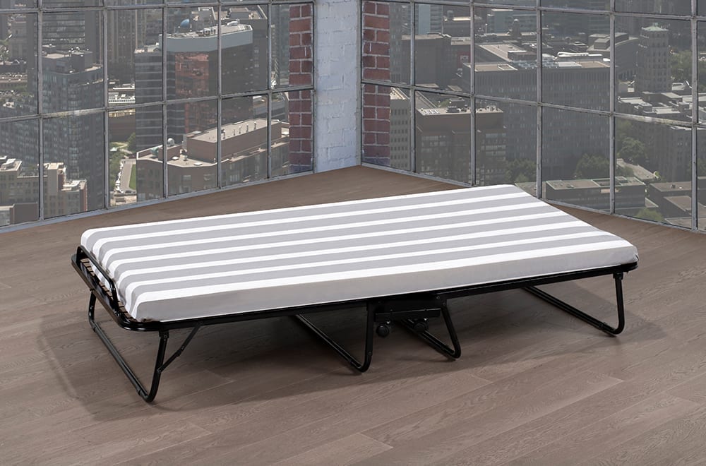 Folding bed with a striped mattress and black metal frame.
