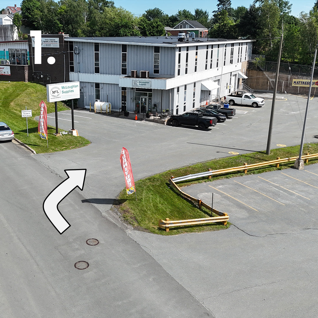 Driveway entrance to Furniture Spot & Mattress Outlet on Strawberry Hill St, Halifax