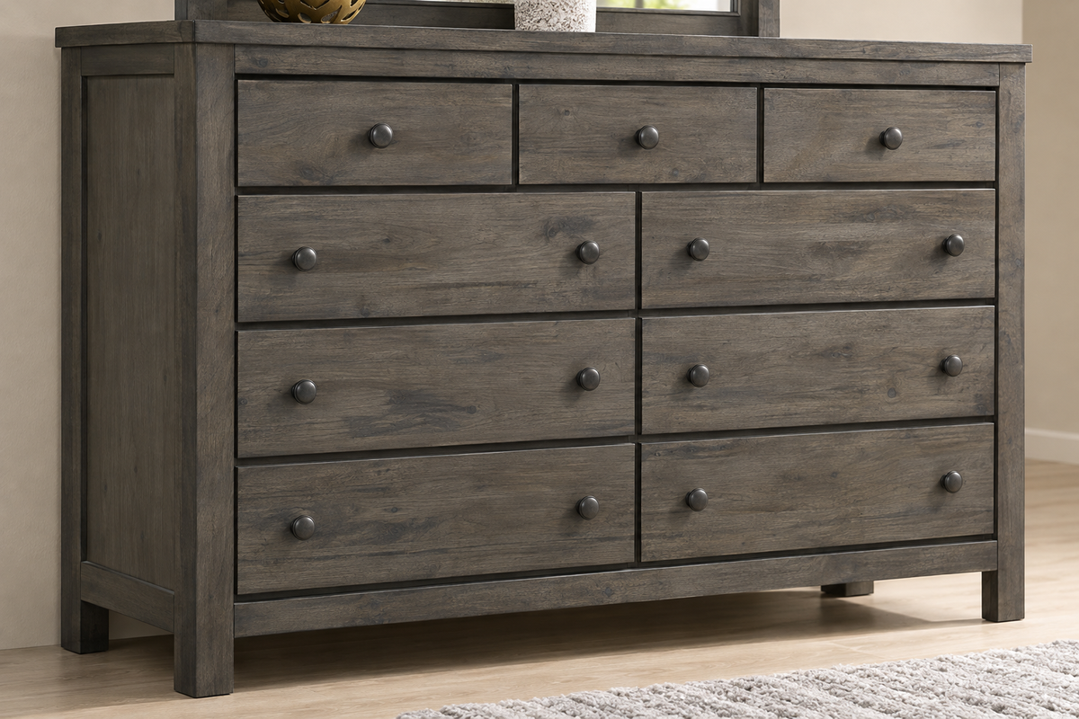 Detail of the Margaret grey bedroom set dresser showing wood-grain drawer fronts, round knobs and matching frame.