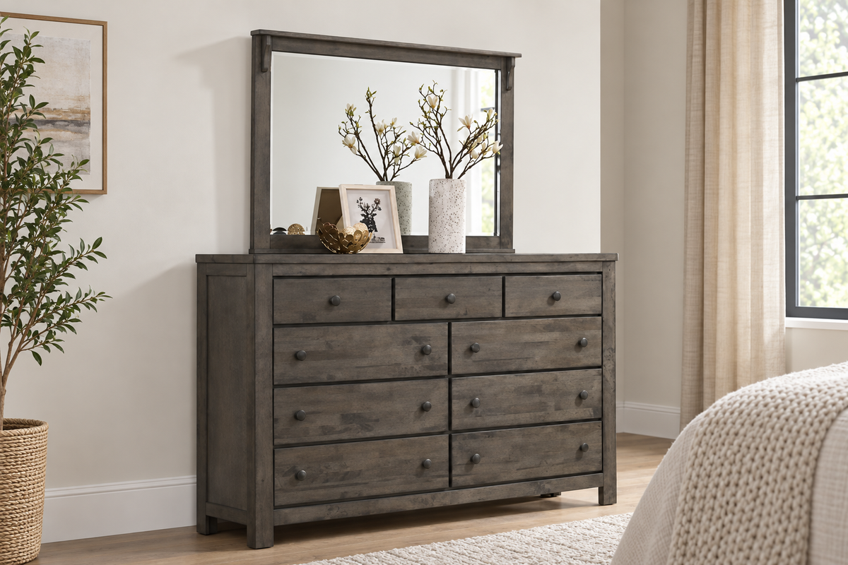 Margaret grey framed mirror displayed above a matching dresser in a bedroom; dresser sold separately.