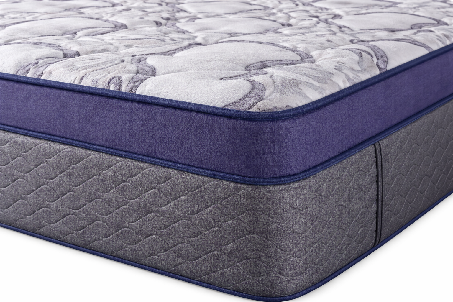 Close-up corner view of the Tension Ease Luxury memory foam mattress showing stitching, purple euro top, and side fabric